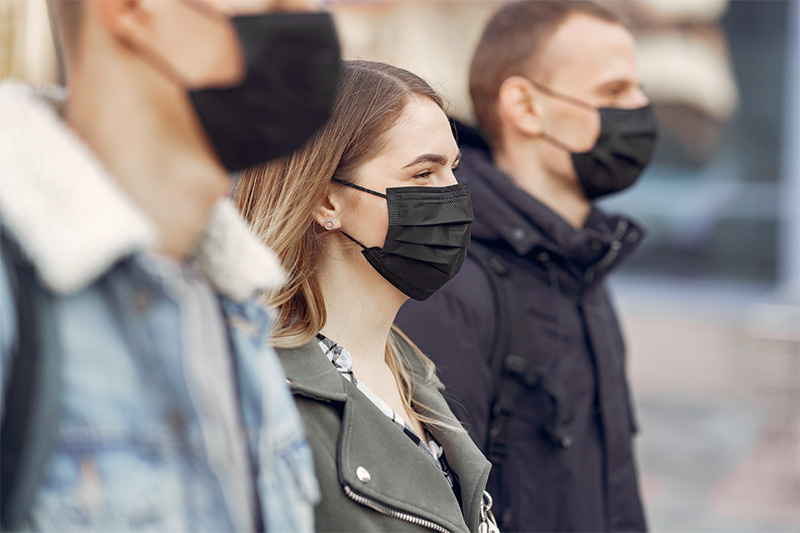 Photo of people wearing masks